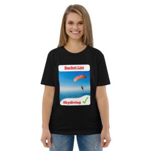 Smiling woman in a black T‑shirt with a 'Bucket List' graphic showing a skydiving photo on the front.
